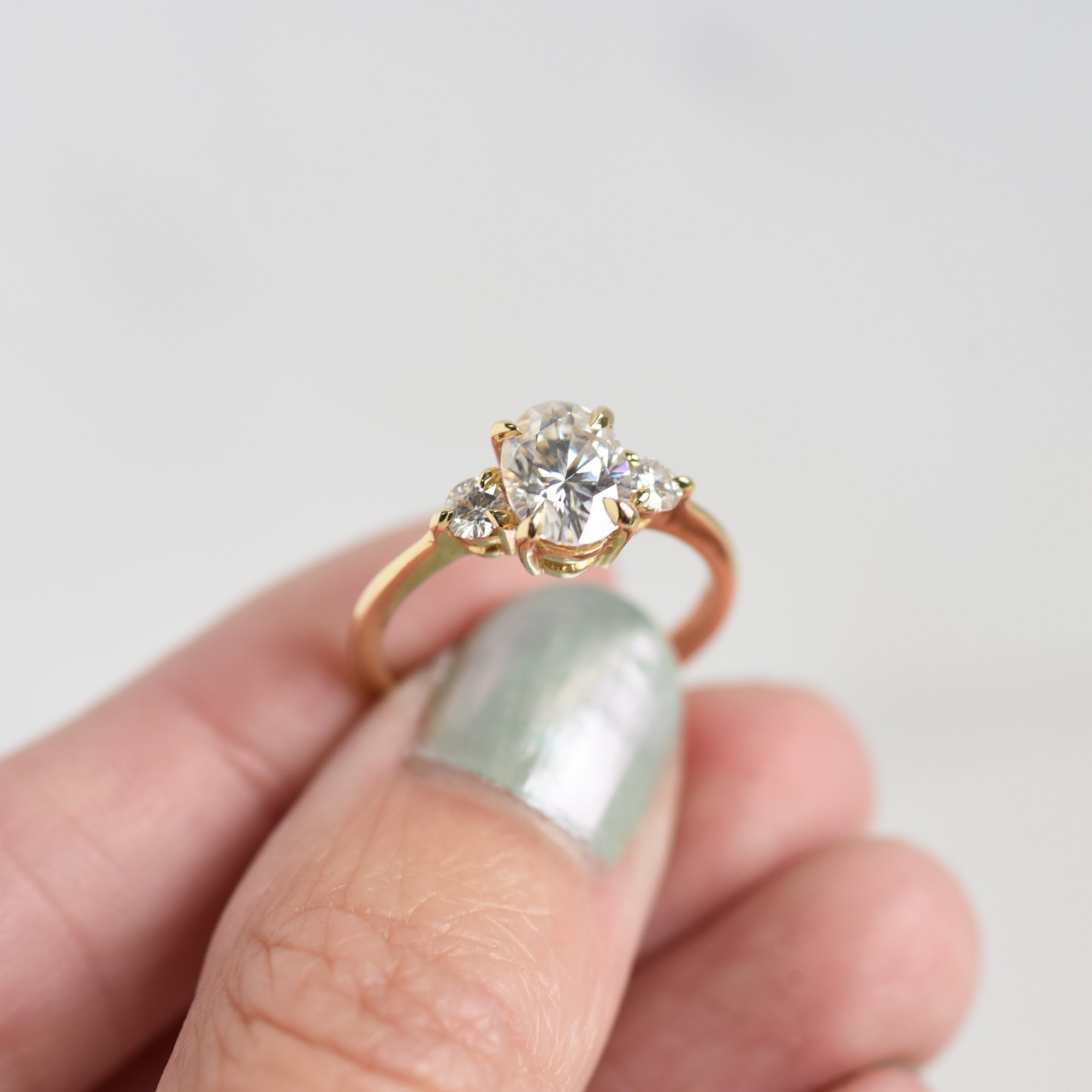 three stone oval round